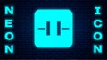 Glowing neon Electrolytic capacitor icon isolated on brick wall background. Vector