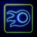 Glowing neon Fireball icon isolated on blue background
