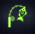 Glowing neon Fishing rod and fish icon isolated on brick wall background. Fishing equipment and fish farming topics