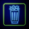 Glowing neon Full trash can icon isolated on blue background. Garbage bin sign. Recycle basket icon. Office trash icon Royalty Free Stock Photo