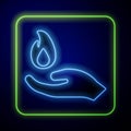 Glowing neon Hand holding a fire icon isolated on blue background Royalty Free Stock Photo