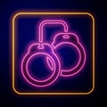 Glowing neon Handcuffs icon isolated on black background. Vector