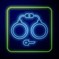 Glowing neon Handcuffs icon isolated on blue background. Vector