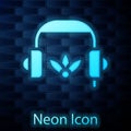 Glowing neon Headphones for meditation icon isolated on brick wall background. Vector Royalty Free Stock Photo