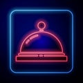 Glowing neon Hotel service bell icon isolated on blue background. Reception bell. Vector Illustration