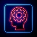 Glowing neon Human head with gear inside icon isolated on blue background. Artificial intelligence. Thinking brain Royalty Free Stock Photo