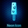 Glowing neon Ice cream on stick icon isolated on brick wall background. Sweet symbol. Vector Royalty Free Stock Photo