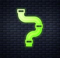 Glowing neon Industry metallic pipe icon isolated on brick wall background. Plumbing pipeline parts of different shapes