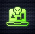 Glowing neon Internet piracy icon isolated on brick wall background. Online piracy. Cyberspace crime with file download
