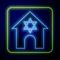 Glowing neon Jewish synagogue building or jewish temple icon isolated on blue background. Hebrew or judaism construction