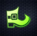 Glowing neon Leprechaun boot icon isolated on brick wall background. Happy Saint Patricks day. National Irish holiday