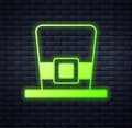 Glowing neon Leprechaun hat icon isolated on brick wall background. Happy Saint Patricks day. National Irish holiday