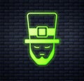 Glowing neon Leprechaun icon isolated on brick wall background. Happy Saint Patricks day. National Irish holiday. Vector