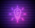 Glowing neon Light bulb with dollar symbol icon isolated on brick wall background. Money making ideas. Fintech innovation concept Royalty Free Stock Photo