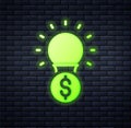 Glowing neon Light bulb with dollar symbol icon isolated on brick wall background. Money making ideas. Fintech Royalty Free Stock Photo