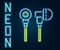 Glowing neon line Air headphones icon icon isolated on black background. Holder wireless in case earphones garniture Royalty Free Stock Photo