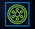 Glowing neon line Alloy wheel for a car icon isolated on brick wall background. Vector Illustration Royalty Free Stock Photo