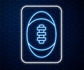 Glowing neon line American Football ball icon isolated on brick wall background. Rugby ball icon. Team sport game symbol