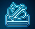 Glowing neon line Archeology icon isolated on blue background. Vector