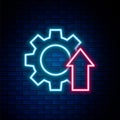 Glowing neon line Arrow growth gear business icon isolated on brick wall background. Productivity icon. Colorful outline Royalty Free Stock Photo