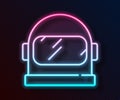 Glowing neon line Astronaut helmet icon isolated on black background. Vector