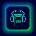 Glowing neon line Audio book icon isolated on black background. Book with headphones. Audio guide sign. Online learning Royalty Free Stock Photo