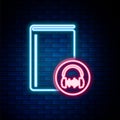 Glowing neon line Audio book icon isolated on brick wall background. Book with headphones. Audio guide sign. Online Royalty Free Stock Photo