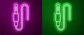 Glowing neon line Audio jack icon isolated on purple and green background. Audio cable for connection sound equipment Royalty Free Stock Photo