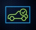 Glowing neon line Auto service check automotive icon isolated on brick wall background. Car service. Vector