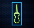 Glowing neon line Awl tool with wooden handle icon isolated on brick wall background. Work equipment tailor industry Royalty Free Stock Photo