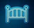 Glowing neon line Baby crib cradle bed icon isolated on blue background. Vector Royalty Free Stock Photo