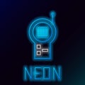 Glowing neon line Baby Monitor Walkie Talkie icon isolated on black background. Colorful outline concept. Vector Royalty Free Stock Photo
