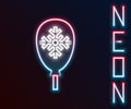 Glowing neon line Balloons with snowflake icon isolated on black background. Merry Christmas and Happy New Year Royalty Free Stock Photo