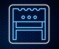 Glowing neon line BBQ brazier icon isolated on brick wall background. Vector