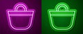 Glowing neon line Beach bag icon isolated on purple and green background. Vector Royalty Free Stock Photo