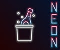 Glowing neon line Bottle of champagne in an ice bucket icon isolated on black background. Colorful outline concept Royalty Free Stock Photo