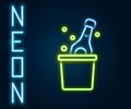 Glowing neon line Bottle of champagne in an ice bucket icon isolated on black background. Colorful outline concept Royalty Free Stock Photo