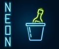 Glowing neon line Bottle of champagne in an ice bucket icon isolated on black background. Colorful outline concept Royalty Free Stock Photo