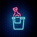 Glowing neon line Bottle of champagne in an ice bucket icon isolated on brick wall background. Colorful outline concept Royalty Free Stock Photo