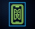 Glowing neon line Buy cinema ticket online icon isolated on brick wall background. Service Concept. Vector Royalty Free Stock Photo