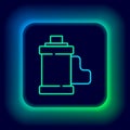 Glowing neon line Camera vintage film roll cartridge icon isolated on black background. 35mm film canister. Filmstrip