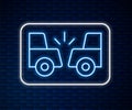 Glowing neon line Car accident icon isolated on brick wall background. Auto accident involving two cars. Vector