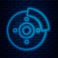 Glowing neon line Car brake disk with caliper icon isolated on brick wall background. Vector