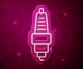 Glowing neon line Car spark plug icon isolated on red background. Car electric candle. Vector Royalty Free Stock Photo