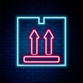 Glowing neon line Cardboard box with traffic symbol icon isolated on brick wall background. Box, package, parcel sign Royalty Free Stock Photo