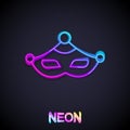 Glowing neon line Carnival mask icon isolated on black background. Masquerade party mask. Vector