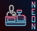 Glowing neon line Cashier at cash register supermarket icon isolated on black background. Shop assistant, cashier