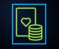Glowing neon line Casino chip and playing cards icon isolated on brick wall background. Casino poker. Vector Royalty Free Stock Photo