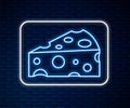 Glowing neon line Cheese icon isolated on brick wall background. Vector