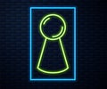 Glowing neon line Chip for board game icon isolated on brick wall background. Vector